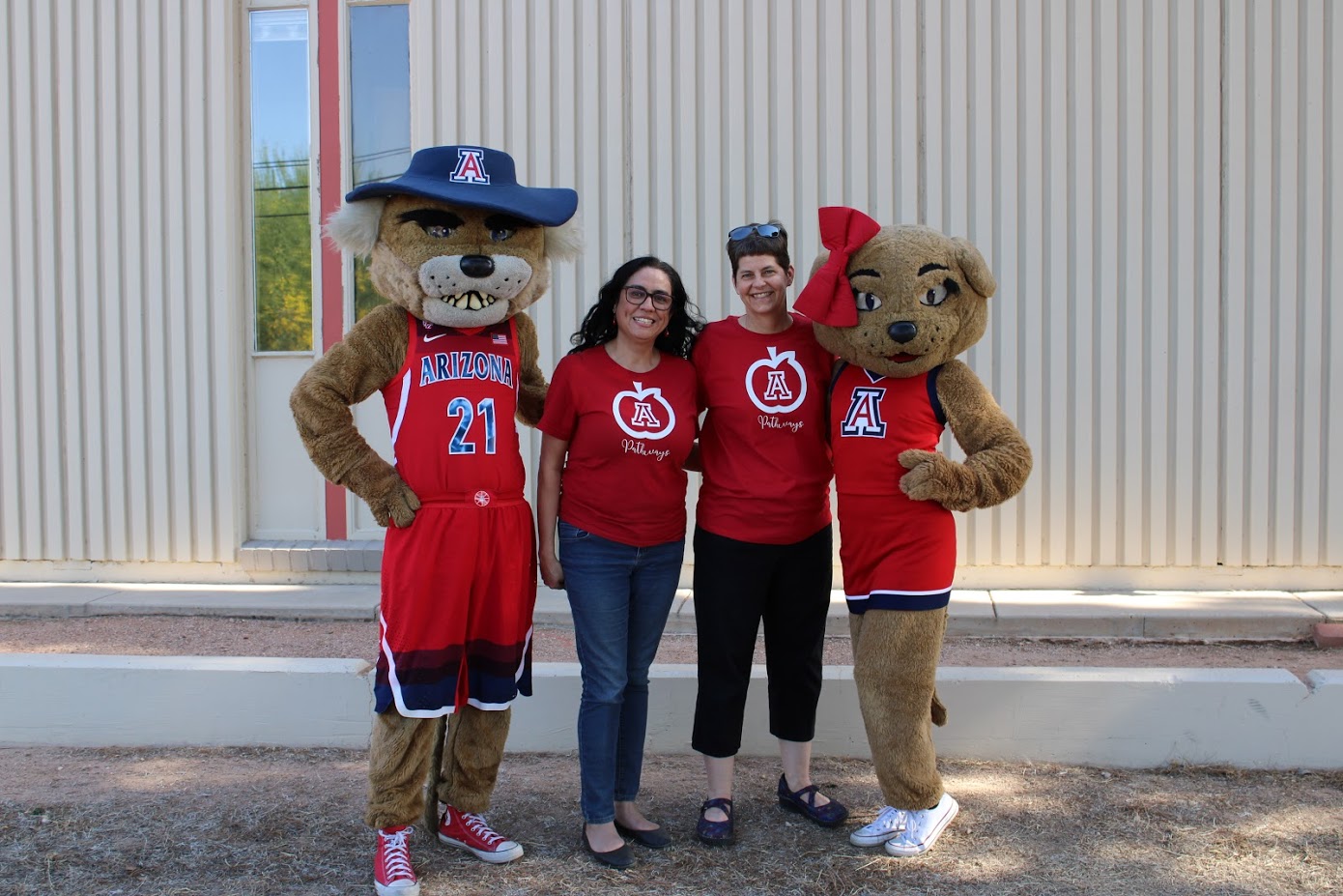 Maria Orozco and Marcy Wood with Wilbur and Wilma Wildcat