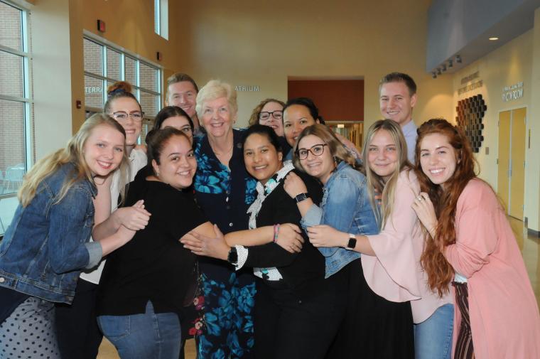 Emily Meschter, funder of our Arizona Teaching Fellows program, surrounded by the Teaching Fellows at the 2019 annual scholarship breakfast.