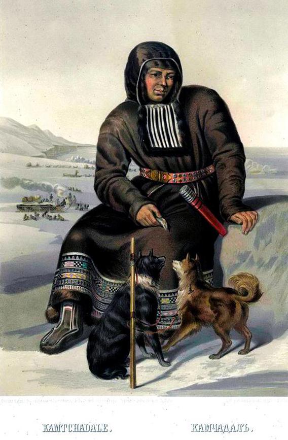 itlemen sitting on a rock with two dogs at his feet