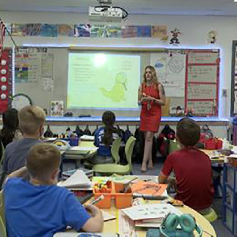 caitlin scott teaching in a classroom