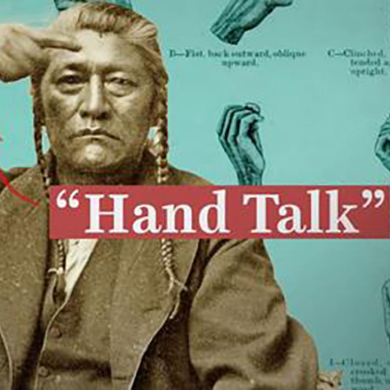 native american doing a hand signal