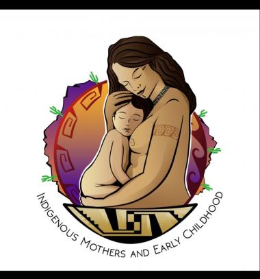 indigenous mother cradling an infant